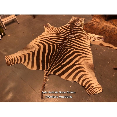 545 - CIRCA 1930 GREVY'S BROWN AND WHITE ZEBRA SKIN RUG, 256 X 170CM