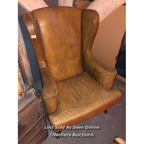 555 - 20TH CENTURY FAUX SNAKE SKIN LEATHER WING BACK CHAIR, CABRIOLE LEG, 74 X 65 X 110CM