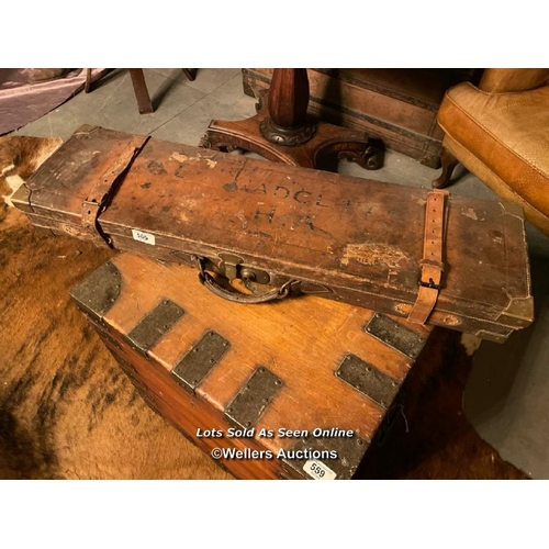 565 - 19TH CENTURY LEATHER GUN CASE WITH BRASS CORNERS, RED VELVET LINED, 83 X 23CM