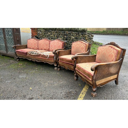 172 - ORNATELY CARVED DOUBLE CANED BERGERE LOUNGE SUITE, IN NEED OF SOME RESTORATION, THREE SEATER SECTION... 