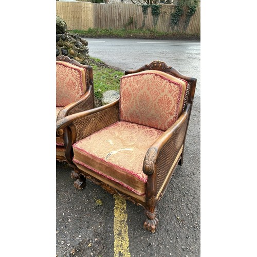 172 - ORNATELY CARVED DOUBLE CANED BERGERE LOUNGE SUITE, IN NEED OF SOME RESTORATION, THREE SEATER SECTION... 