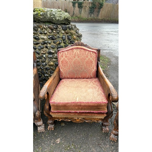 172 - ORNATELY CARVED DOUBLE CANED BERGERE LOUNGE SUITE, IN NEED OF SOME RESTORATION, THREE SEATER SECTION... 