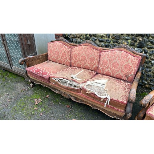 172 - ORNATELY CARVED DOUBLE CANED BERGERE LOUNGE SUITE, IN NEED OF SOME RESTORATION, THREE SEATER SECTION... 