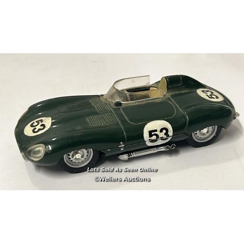 23 - Three vintage diecast cars including Dinky no.133, Cunningham C-5R, off white body with brown interi... 