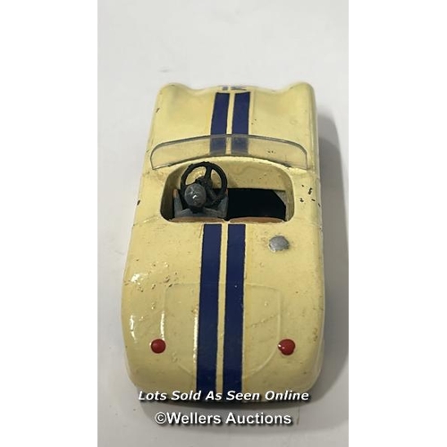 23 - Three vintage diecast cars including Dinky no.133, Cunningham C-5R, off white body with brown interi... 