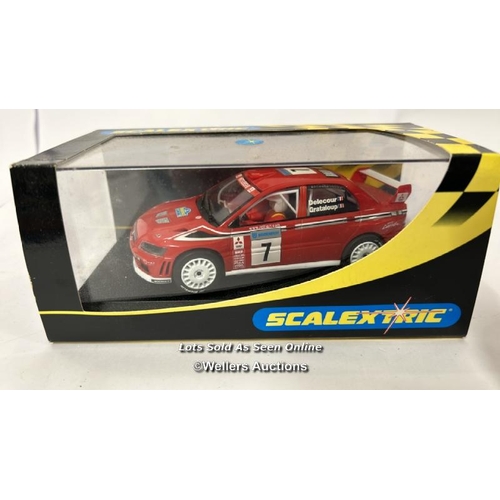 25 - Three boxed & unboxed Scalextric cars including MGB 1964 Sebring and Mitsubishi Lancer / AN4