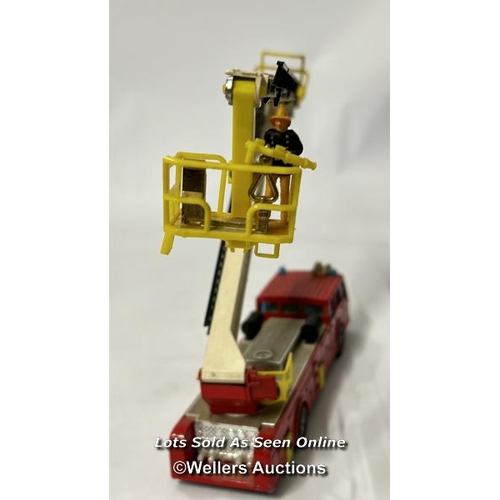 26 - Assorted model vehicles including boxed Tomy Toyota Hilux Bigfoot, Corgi fire truck, Tesco truck and... 