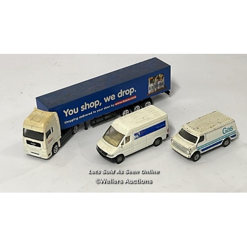 26 - Assorted model vehicles including boxed Tomy Toyota Hilux Bigfoot, Corgi fire truck, Tesco truck and... 