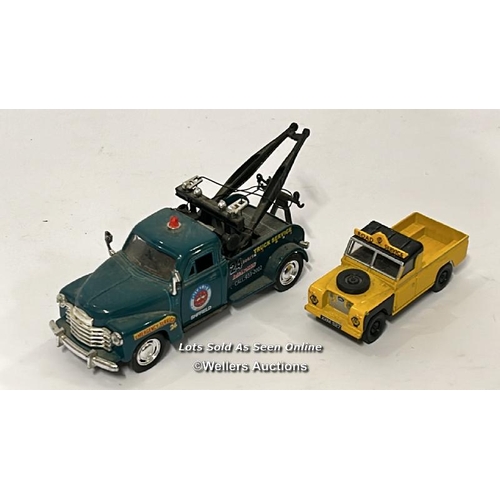 26 - Assorted model vehicles including boxed Tomy Toyota Hilux Bigfoot, Corgi fire truck, Tesco truck and... 