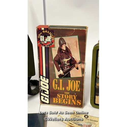 4 - Assorted GI Joe items including mobile field unit phone, tin lunchbox, patches and collectors cards ... 