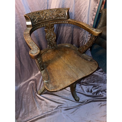 598 - OAK CAPTAINS CHAIR WITH FOLIATE CARVING, 56 X 52 X 81CM