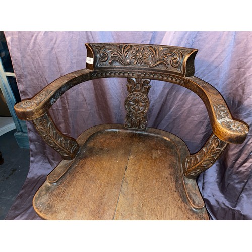 598 - OAK CAPTAINS CHAIR WITH FOLIATE CARVING, 56 X 52 X 81CM