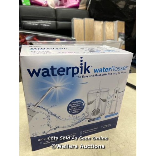 2077 - WATERPIK WATER FLOSSER / NEW & SEALED / C30