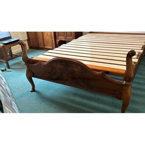 152 - Walnut bedframe, with scalloped head rest carved finials and wooden slats, total Lenth 203cm, width ... 