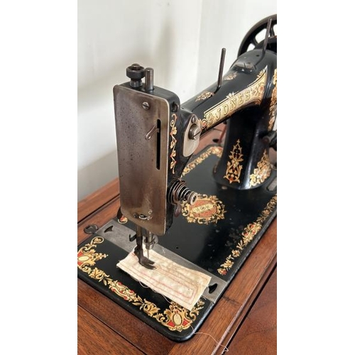 161 - Jones sewing machine number 33225 with flip top table 75cm high (collection from private residence i... 