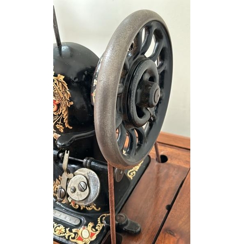 161 - Jones sewing machine number 33225 with flip top table 75cm high (collection from private residence i... 