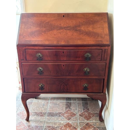 162 - Mahogany bureau with three drawers and brass fittings, 74x98.5 x 40cm (collection from private resid... 