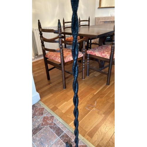 166 - Cast iron candle holder of twisted form, 123cm high (collection from private residence in Weybridge,... 