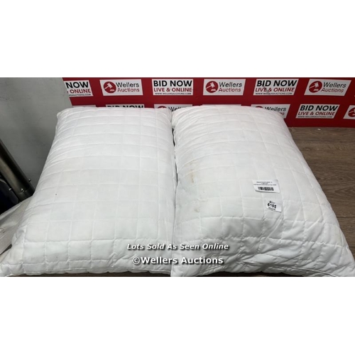 6195 - HOTEL GRAND SHREDDED MEMORY FOAM ROLLED PILLOWS / WET / SOME MARKS SEE IMAGES