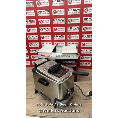 75 - TEFAL OLEOCLEAN PRO DEEP FRYER FR804140 / DENTED(SEE IMAGES) / POWERS UP / SIGNS OF USE / C31