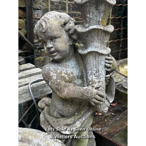 666 - COMPOSITION STONE CHERUB SUPPORTING CORNUCOPIA, PREVIOUSLY ILLUMINATED, THIS LOT IS LOCATED AWAY FRO... 