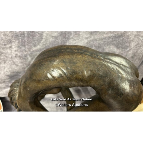 28 - A large bronze effect resin study of a nude female on wooden  base, numbered 5/95, 50cm high / AN1
