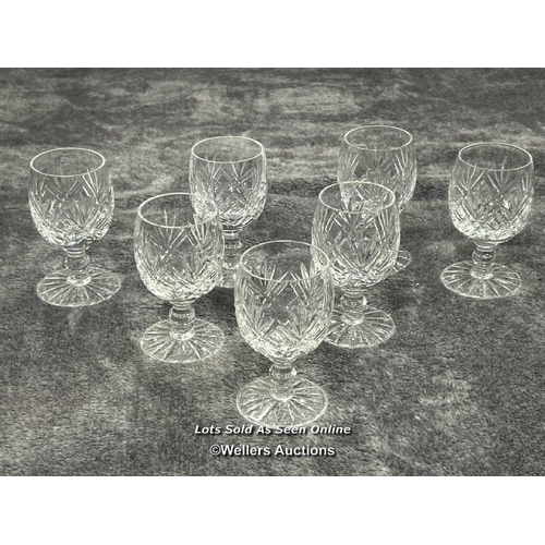 64 - Seven lead crystal Sherry glasses in good condition / AN8