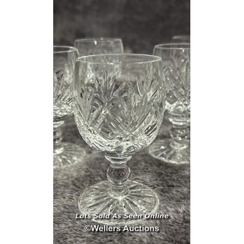 64 - Seven lead crystal Sherry glasses in good condition / AN8