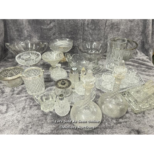 70 - A large collection of glassware including decanters, bowls, vase, rose bowl and cheese dish / AN11