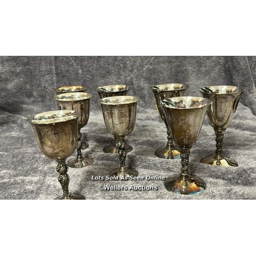 73 - A large collection of antique metal plated items including a three armed candelabra, goblets, brush ... 