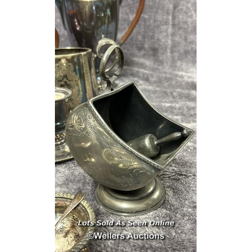 73 - A large collection of antique metal plated items including a three armed candelabra, goblets, brush ... 