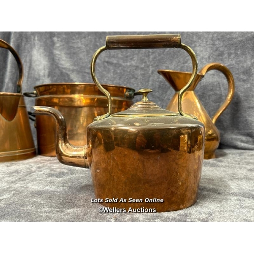 77 - Vintage copper kitchen ware including braising pan, jugs, kettle pot and two long handled cream skim... 