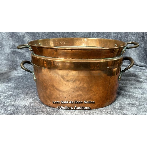 77 - Vintage copper kitchen ware including braising pan, jugs, kettle pot and two long handled cream skim... 