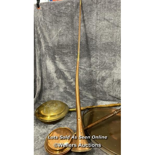 78 - Assorted copper & brass ware including hunting horn, large tray (61.5cm wide), pot and two bed warme... 