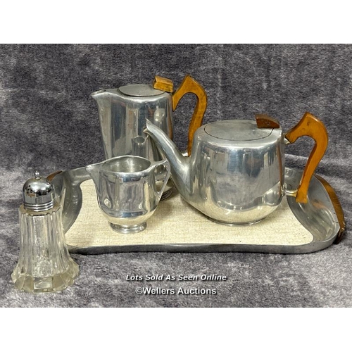 79 - A four piece Picquot Ware part tea and coffee service including coffee pot, tea pot, milk jug and tr... 