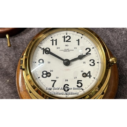 83 - Wempe Chronometerwerke Hamburg brass ships clock mounted on wood with key, clock face 11cm diameter,... 