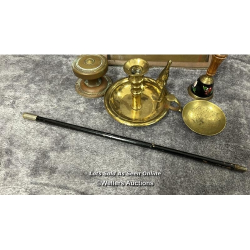 84 - Assorted mainly brass items including candle holders, letter box, bell and door knob with a metal st... 