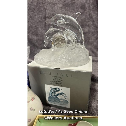 86 - Assorted items including boxed Boutique crystal dolphins, Clarendon crystal footed dish, H. Samuel r... 