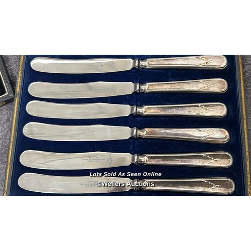 87 - A quantity of boxed and unboxed cuttlery including a Webber and Hill hallmarked silver handled cake ... 