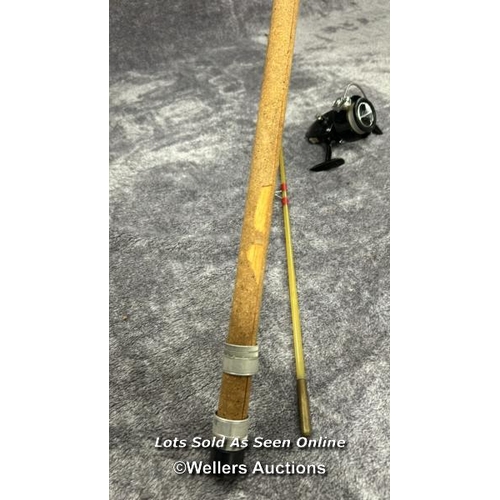 131 - Vintage fibreglass fishing rod with cork handle, 265cm long with a Prince regent reel / AN16