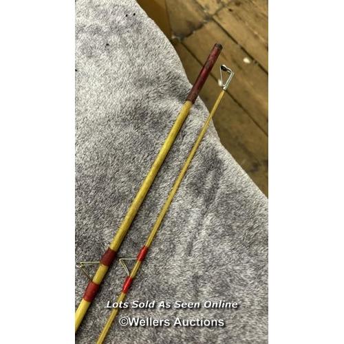 131 - Vintage fibreglass fishing rod with cork handle, 265cm long with a Prince regent reel / AN16