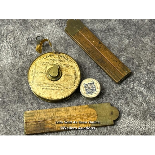 110 - Vintage brass lawn tennis measure, small E.B Mitchell 'The Royal Diadem' tape measure and two vintag... 