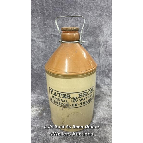 98 - Three glazed stoneware bottles including a large vintage Yates Bros Mineral Water bottle, 43cm high,... 