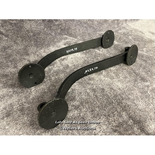 207 - A pair of solid iron door pull handles in scroll form, 36.5cm long