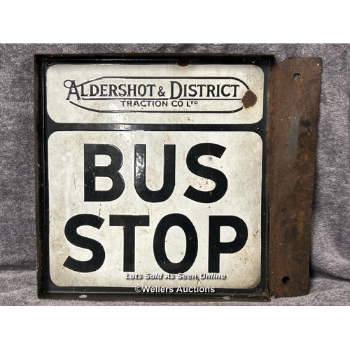 128 - Enamel Aldershot & District Traction Co Ltd double sided Bus Stop sign, 36x32cm / AN24