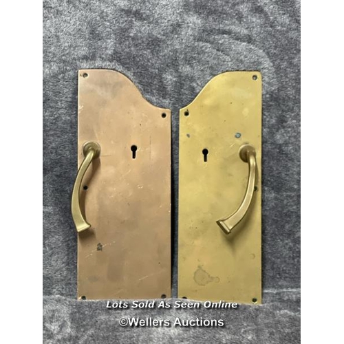 209 - Two similar brass pull handles mounted on shaped back plate, in similar style to those at the famous... 