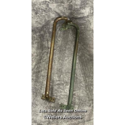 210 - A pair of 'push' and 'pull' brass door handles, each measuring between 76.5cm - 77.5cm long