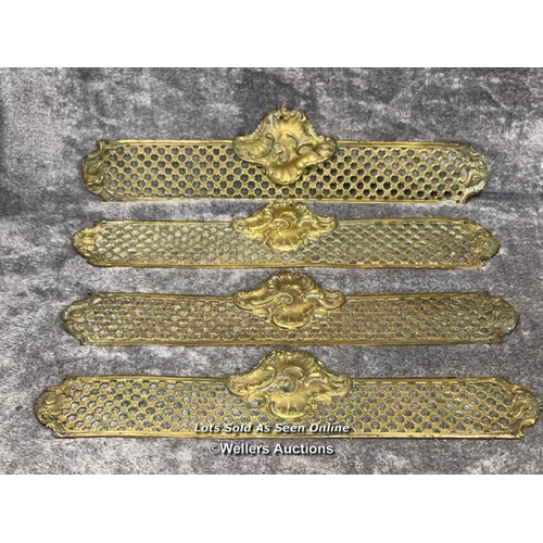 211 - Four brass door handle backings with floral centrepiece and edging, 47cm long x 11.5cm wide