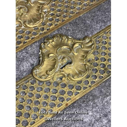 211 - Four brass door handle backings with floral centrepiece and edging, 47cm long x 11.5cm wide