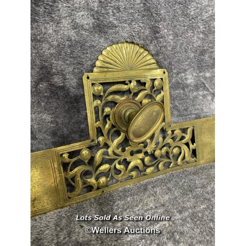 212 - A single brass door handle feature including back plate and handle, 56cm long x 23cm wide